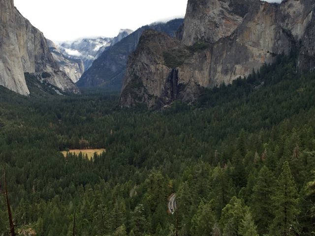 It's hard to see, but Half Dome and Bridalveil Fall are in the background.  The highway is far below in the trees.